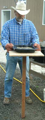 Filling the stepping stone mold on a work board